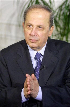 The exiled Lebanese Christian General Michel Aoun, the former army commander, addresses journalists during an interview at his Paris residence, August 10, 2001.