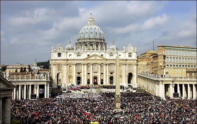 During the funeral mass for Pope John Paul II, crowds pack St. Peter's Square at the Vatican, April 8, 2005.