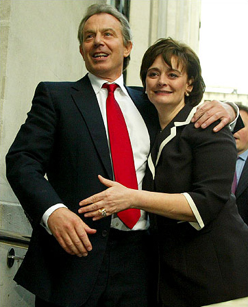 Prime Minister Tony Blair, with his wife, Cherie, greets Labor Party supporters after winning a third successive term, London, May 6, 2005.