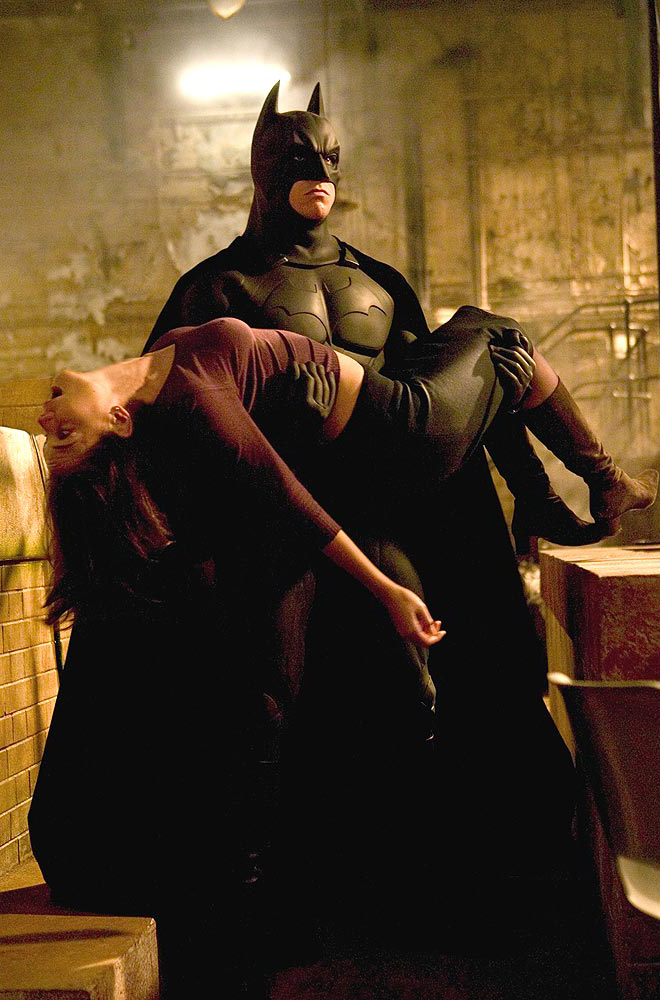 Christian Bale as Batman and Katie Holmes as Rachel Dawes in 'Batman Begins' (2005).