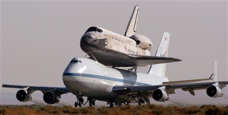 The space shuttle Discovery takes off mounted to a Boeing 747 from Edwards Air Force Base, California, August 19, 2005.