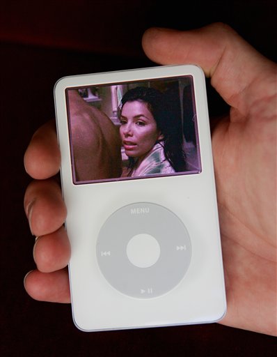 Eva Longoria who plays Gabrielle Solis in the ABC hit television show Desperate Housewives is shown on a new iPod at the Apple Computer Inc. unveiling of the new iPod in San Jose, California, October 12, 2005.