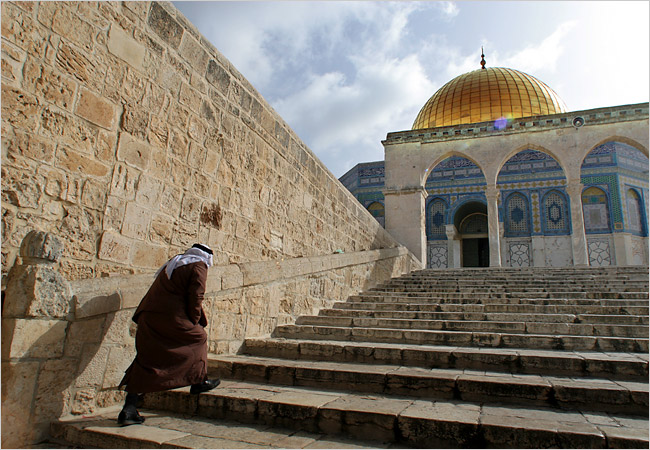 An Muslim man makes his way to morning prayers at the Haram al-Sharif, April 2006.