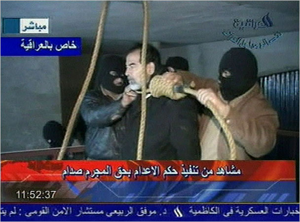 A frame grab from Iraqi state television, Al Iraqiya, shows a noose being placed around Saddam Husseins neck before his hanging, Baghdad, early December 30, 2006.