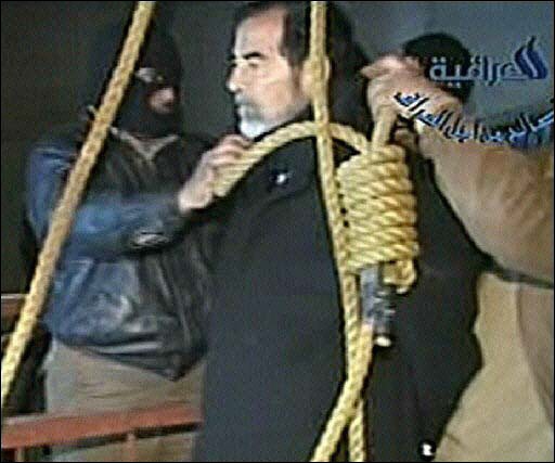 A frame grab from Iraqi state television, Al Iraqiya, shows a noose being placed around Saddam Husseins neck before his hanging, Baghdad, early December 30, 2006.