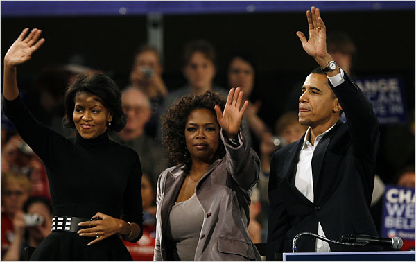 Oprah Winfrey, center, joins Barak Hussein Obama and his wife, Michelle, on the campaign trail, Des Moines, Iowa, December 8, 2007.