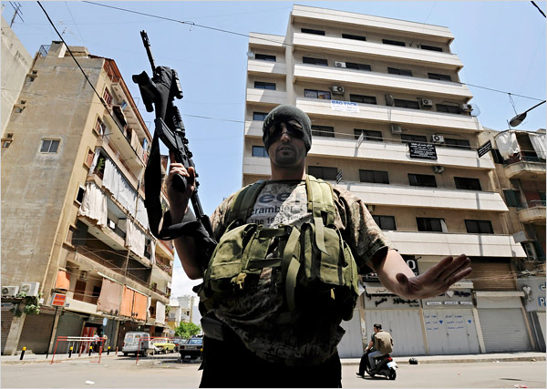 A gunman from the Shiite Amal group guarding an intersection in a Beirut neighborhood, May 9, 2008.