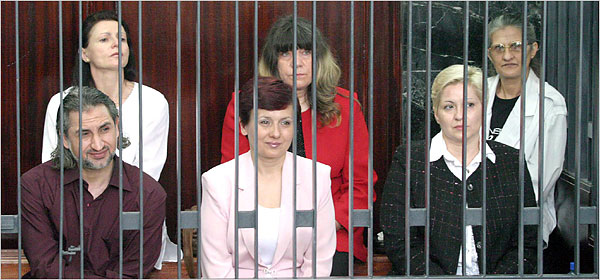 A Palestinian doctor, front left, and five Bulgarian nurses, seen in a 2006 photo, face the death penalty after being convicted twice of allegedly intentional infecting some 400 children with H.I.V. at a Benghazi hospital in 1998.