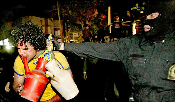 Young men wearing T-shirts deemed too tight or haircuts seen as too Western are paraded bleeding through Tehrans streets by uniformed police officers who force them to suck on plastic jerrycans, a toilet item Iranians use to wash their bottoms, Tehran, 2007.