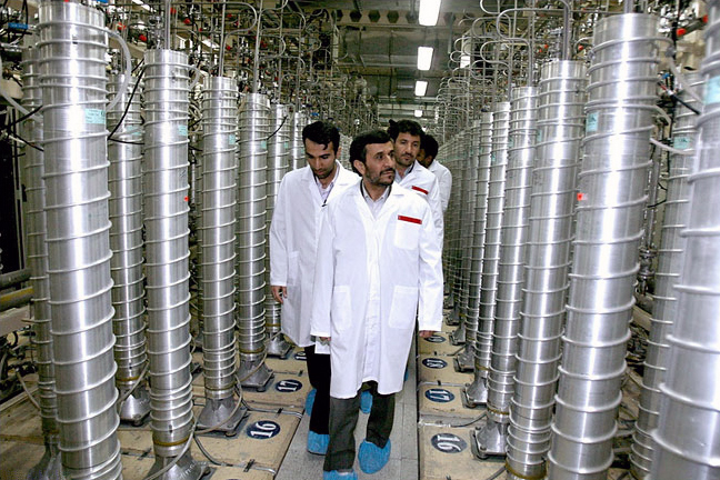 Iranian President Mahmoud Ahmadinejad tours the uranium enrichment centrifuges at Iran’s underground complex at Natanz, south of Tehran, April 8, 2008.