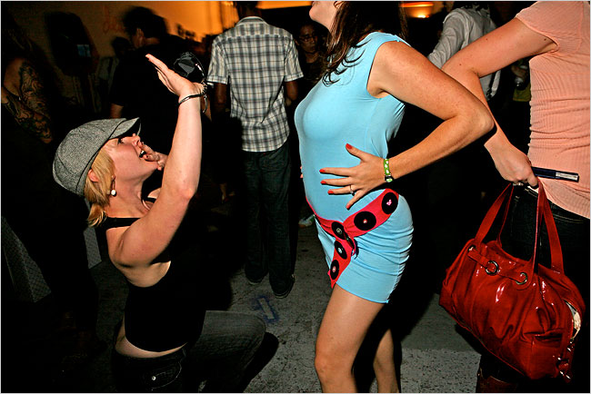 A wall of vinyl makes a rivetingly graphic backdrop for the Master-Disaster Karaoke Showdown, a D.J. spinoff and dance competition held by thehappycorp, a New York events and branding firm, September 2007.