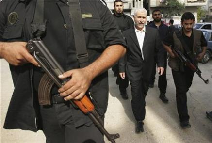 Palestinian Interior Minister Saeed Seyyam walks surrounded by his bodyguards after Friday prayers, Gaza, October 27, 2006.