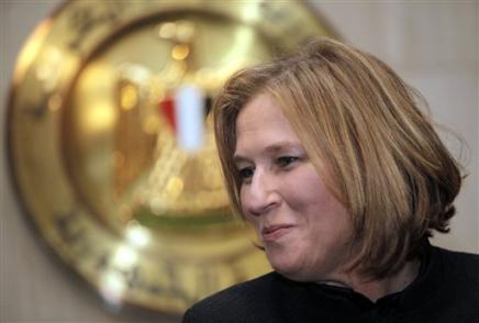 Israeli Foreign Minister Tzipi Livni talks during a news conference, in the front of Egyptian Presidency logo at the Presidential palace, following her meeting with Egyptian President Hosni Mubarak, Cairo, Egypt, December 25, 2008.