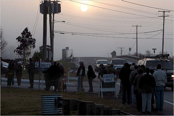 Voters line up in the darkness outside a polling station, Atkinson, New Hampshire, November 4, 2008.
