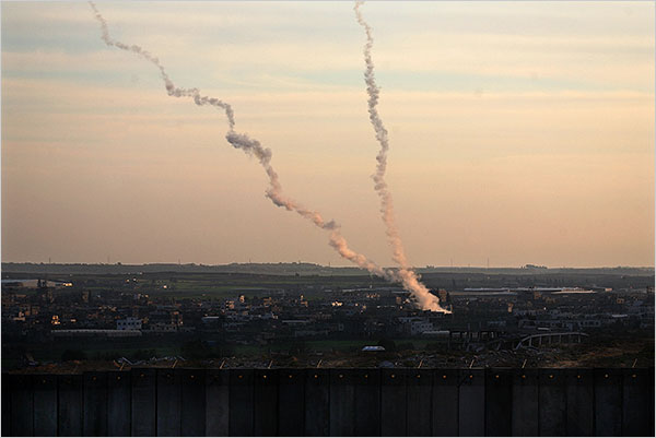 On the second day of Israel’s massive attack on Hamas sites throughout Gaza in retaliation for the recent rocket fire from the area, two rockets fire from inside Gaza as seen from the Israeli side of the border, December 28, 2008.