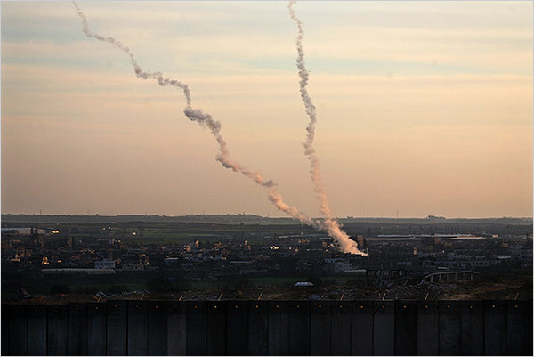 On the second day of Israels massive attack on Hamas sites throughout Gaza in retaliation for the recent rocket fire from the area, two rockets fire from inside Gaza as seen from the Israeli side of the border, December 28, 2008.
