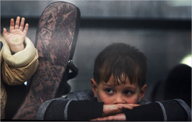 On the seventh day of Israel’s massive attack on Hamas sites throughout Gaza in retaliation for the recent rocket fire from the area, a Palestinian boy with Russian citizenship among the foreigners whom Israel allowed to leave Gaza, January 2, 2009.
