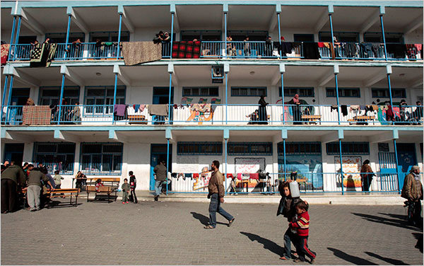 On the twelfth day of Israels war against Gaza, Palestinians who fled their homes settle at a United Nations school, Jabaliya, January 7, 2009.