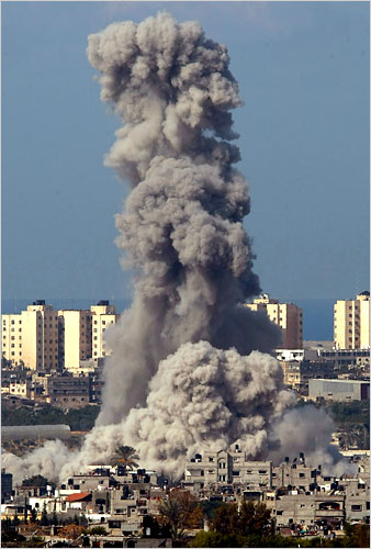 On the fourteenth day of Israels war against Gaza, an explosion from an Israeli attack rocks Beit Hanoun, Gaza, January 9, 2009.