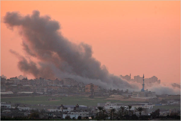 On the eighteenth day of Israel’s war against Gaza, smoke rises from an explosion during an Israeli army land incursion into the Gaza Strip as seen from the Israel side of the border, January 13, 2009.