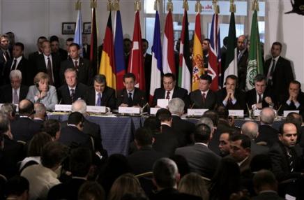 From left to right on the stage Palestinian President Mahmoud Abbas, German Chancellor Angela Merkel, Czech prime Minister Mirek Topolanek, Turkish President Abdullah Gul, French President Nicolas Sarkozy, Egyptian President Hosni Mubarak, Jordan's King Abdullah II, Spanish Prime Minister Jose Zapatero, British Prime Minister Gordon Brown and Italian President Silvio Berlusconi, as they attend a presser at the end of an international conference on the current crisis in the Palestinian territory of Gaza Strip at the Red Sea resort of Sharm el-Sheik, Egypt, January 18, 2009.