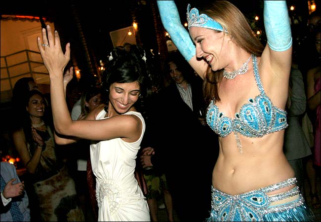 Belly dancing at weddings honors a Lebanese tradition, New York, March 2005.