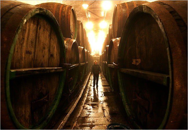 A bank of old-fashioned barrels in the cellar of the Pilsner Urquell brewery, Czech Republic, August 2006.