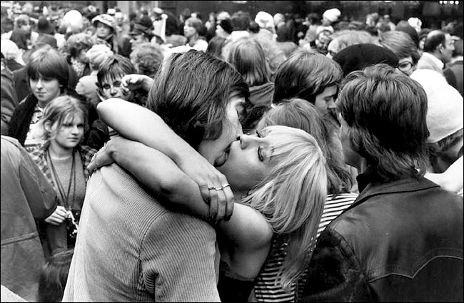 A photo by Henri Cartier-Bresson from a carnival held in Cologne, Germany (1976).