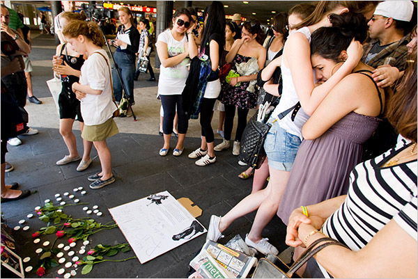 Hundreds of Michael Jackson's fans gather to set up a memorial, 
Sergel Square, Stockholm, Sweden, June 26, 2009.