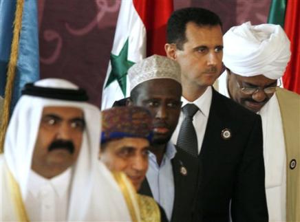 From right, Sudanese President Omar Al-Bashir, Syria's President Bashar al-Asad, Somalia's President Sheik Sharif Sheik Ahmed, Omani Deputy Prime Minister Sayyid Fahd bin Mahmoud Al Said and Emir of Qatar Sheik Hamad bin Khalifa al Thani during the Arab summit, Doha, Qatar, March 30, 2009. 