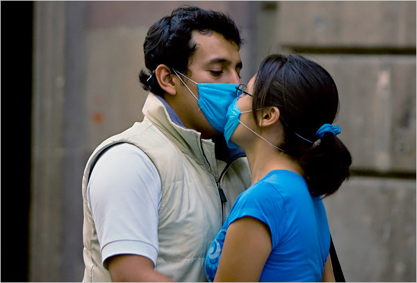 A couple kissing at the Historic Center, Mexico City, April 28, 2009.