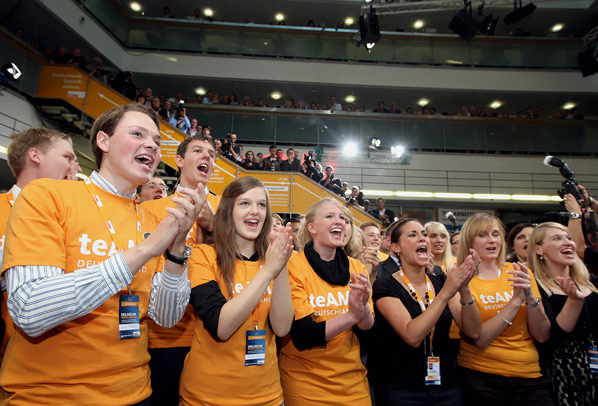 A roar goes up in the crowd at the Christian Democrat Union party headquarters when German public television station ARD announced that the Christian Democrats had won nearly 34 percent of the vote in the after exit polls of the German general election, Berlin, September 27, 2009.