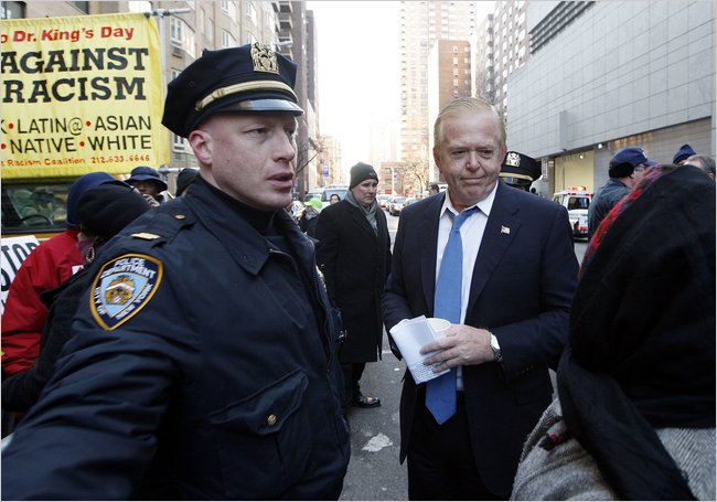 CNN anchor Lou Dobbs at an anti-recism demonstration, 2008.