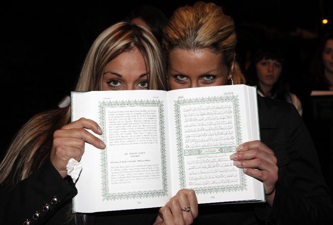 Hundreds of glamorously dressed women, aged between 18 and 35 years old, employed by an Italian modeling agency and taken to the Libyan Ambassadors residence, just to find the Libyan leader Muammar Al-Qaddaf giving each of them a copy of the Quran and enticing them to convert to Islam, Rome, November 15, 2009.