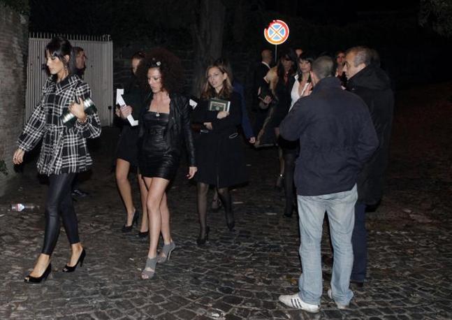 Hundreds of glamorously dressed women, aged between 18 and 35 years old, employed by an Italian modeling agency and taken to the Libyan Ambassadors residence, just to find the Libyan leader Muammar Al-Qaddaf giving each of them a copy of the Quran and enticing them to convert to Islam, Rome, November 15, 2009.