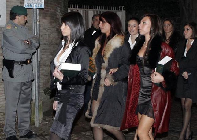 Hundreds of glamorously dressed women, aged between 18 and 35 years old, employed by an Italian modeling agency and taken to the Libyan Ambassadors residence, just to find the Libyan leader Muammar Al-Qaddaf giving each of them a copy of the Quran and enticing them to convert to Islam, Rome, November 15, 2009.