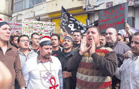 On the occasion of forty-day remembrance of the six Christian young men killed by Muslim gunmen on Eastern-Christmas Eve in Nag Hammadi, Christian Egyptians protest persecuting, or at least not protecting, Egypt's dwindling Christian population, Tahrir Square, Downtown Cairo, February 14, 2010.