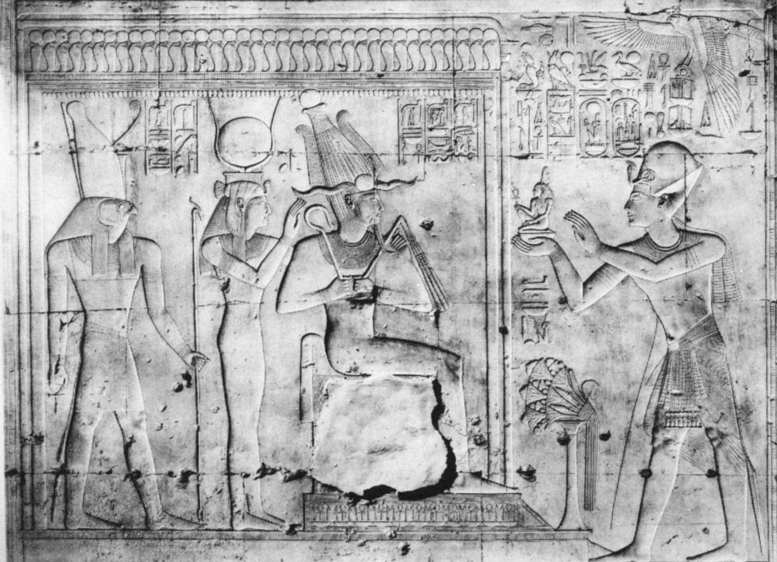 A relief depicting King Seti I offering a figure of Goddess Maat to Osiris, Isis, and Horus, the temple of King Seti I, Abydos, early 13th century BCE.