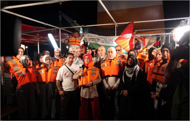 Before the Israeli naval commandos raid, the pro-Palestinian activists hold a news conference aboard the Mavi Marmara, part of a flotilla taking aid to Gaza, Mediterranean Sea, May 30, 2010.