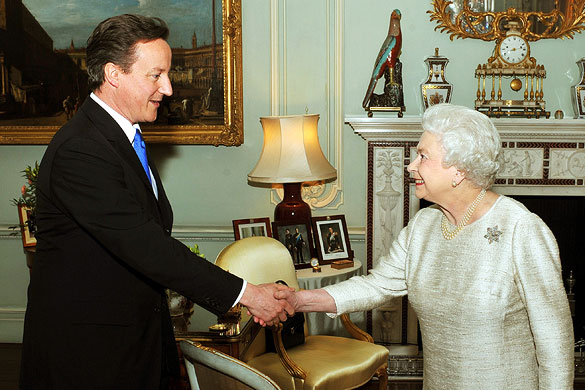 Britain's Queen Elizabeth II greets David Cameron, the leader of the Conservative Party, in an audience to invite him to be the next Prime Minister of the United Kingdom, in a ceremony known as kissing hands, Buckingham Palace, London, May 11, 2010.