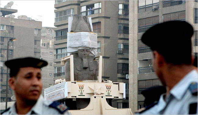 Engineers moves the 3,200-year-old statue of Pharaoh Ramesses II from a congested square in downtown Cairo to its new home at the under-construction Grand Museum near Giza Pyramids, August 25, 2006.