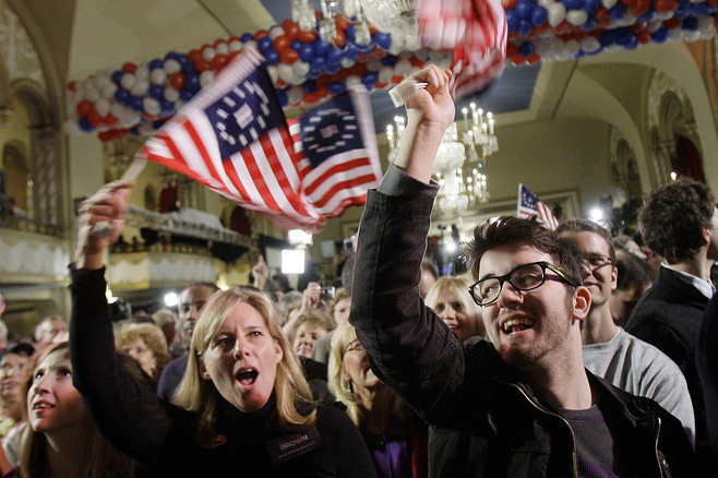 Supporters of Scott Brown, Republican candidate for the Senate, wave the Betsy Ross version of US flag with 13 stars, before results are announced at Brown's election night headquarters, Park Plaza Hotel, Boston, Massachusetts, January 19, 2010.