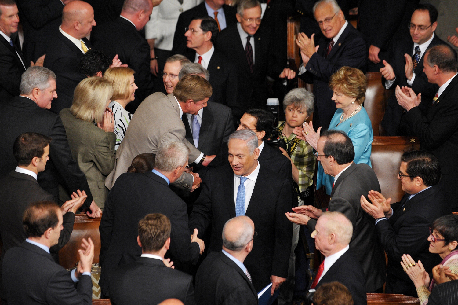 Israel's Prime Minister Benjamin Netanyahu (C) greets members of Congress following a Joint Meeting of Congress at the US Capitol, Washington, May 24, 2011.