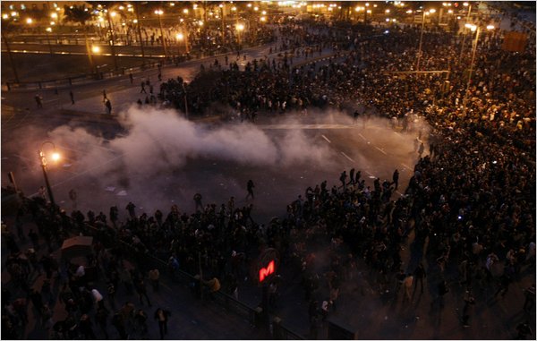 Using teargas, rubber bullets and water cannons, police launch the major attack to disperse instigators led by the Muslim Brotherhood underworld gang, who planned to stay out in Sadat Square, downtown Cairo, Egypt, minutes after midnight, late January 25, 2011.