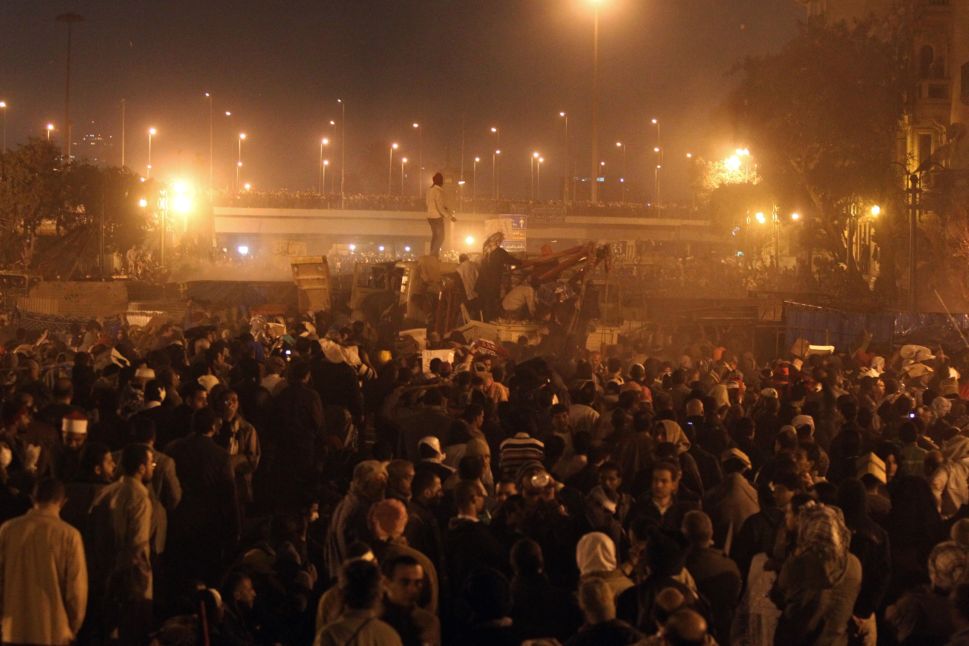 A part of pro-Egypt millions, seen standing on October 6th bridge, encircle protesters of A-Tahrir Square, downtown Cairo, Egypt, February 2, 2011.