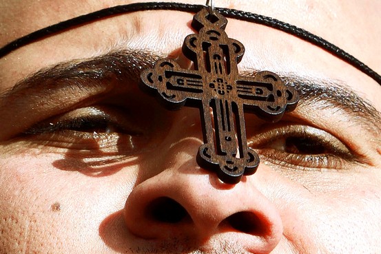 Egyptian Coptic Christians demonstrate calling for state guard of Christians' rights, outside the state Radio and Television Union building, downtown Cairo, Egypt, March 8, 2011.