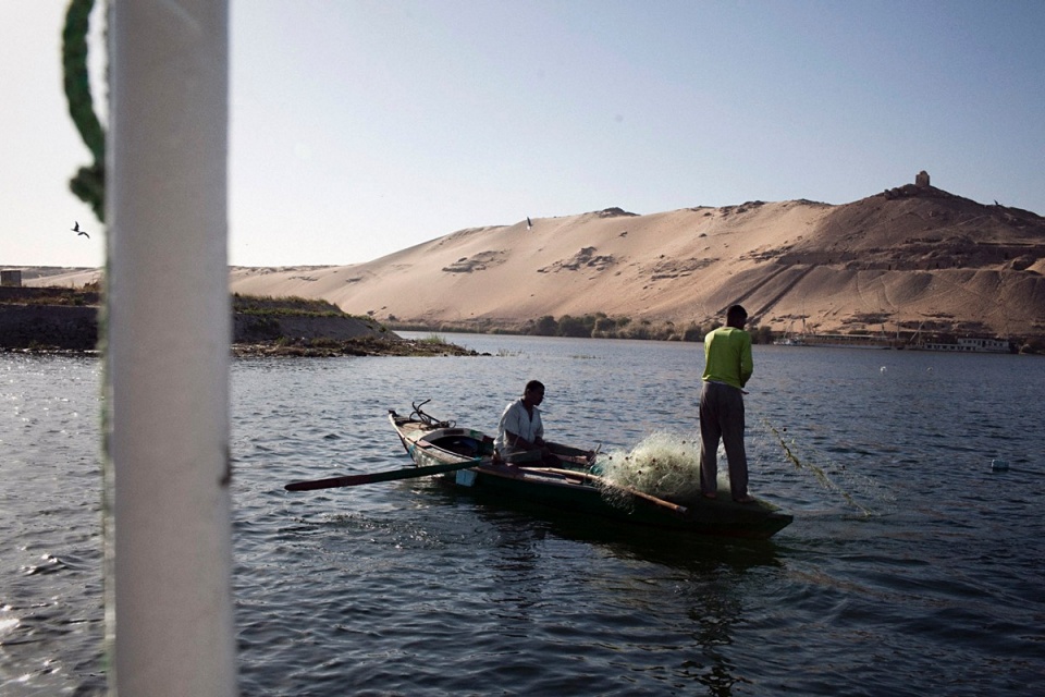 Men fishing in the river near Aswan, early February 2011.