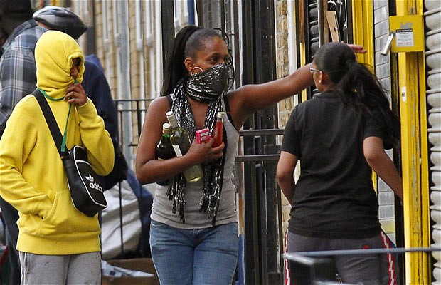 Rioters looting a shop in Hackney riots, London, August 8, 2011.