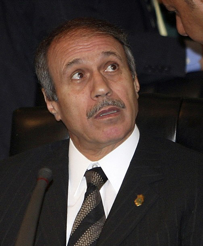 Egypt's Interior Minister Habib el-Adli talks with a delegate at a conference of Interior Ministers from Countries Neighbouring Iraq Saadabad Palace, Tehran, November 30, 2004.