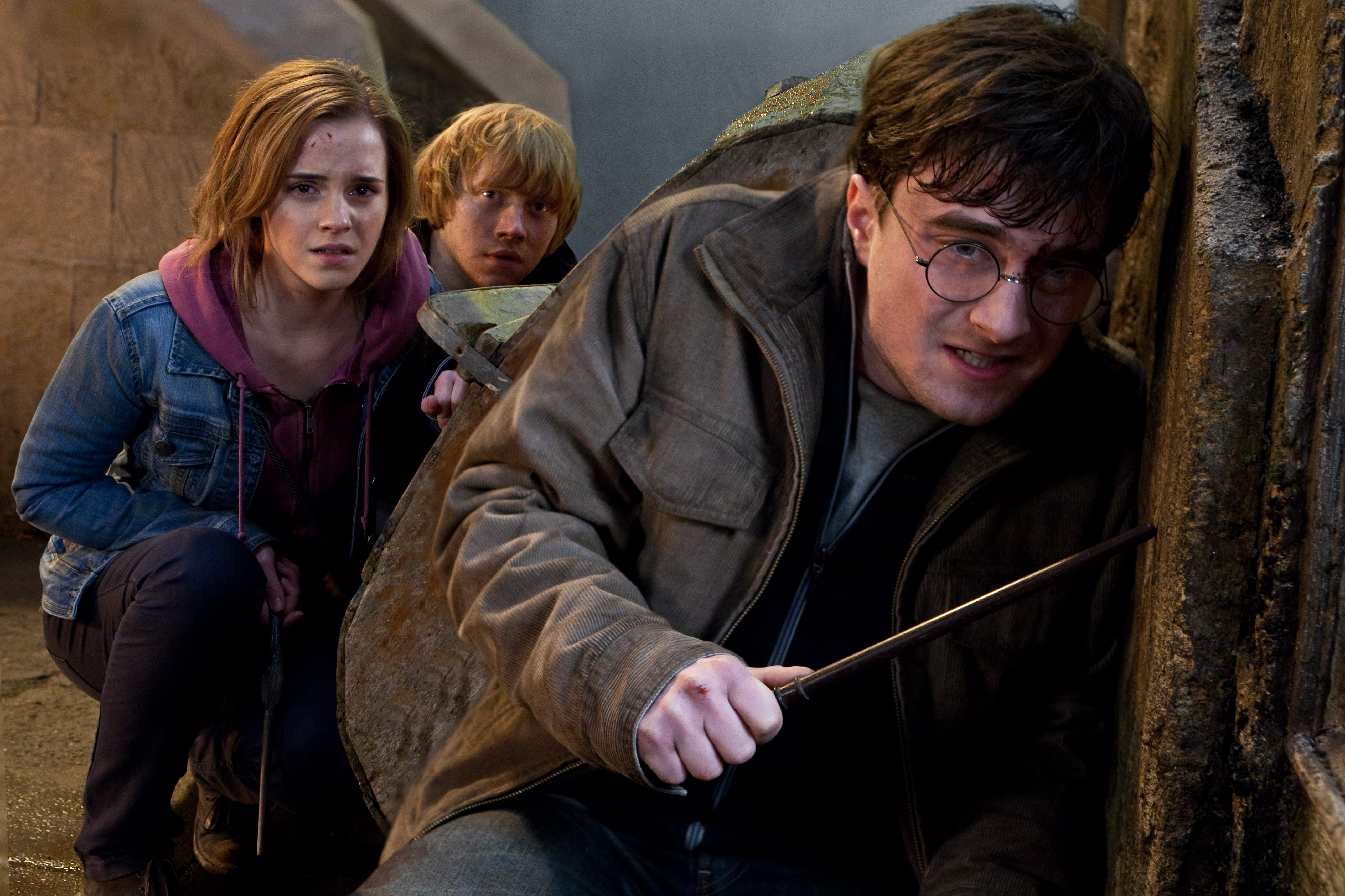 Daniel Radcliffe, right, as Harry Potter, Rupert Grint as Ron Weasley, and Emma Watson as Hermione Granger in 'Harry Potter and the Deathly Hallows —Part 2' (2011).